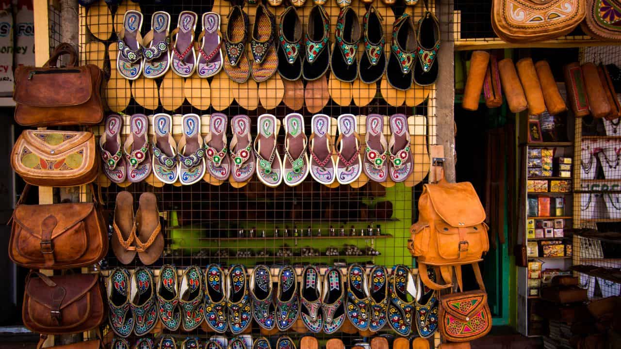 A-display-of-leather-shoes-and-bags-in-a-store-in-Jaipur-India.jpg