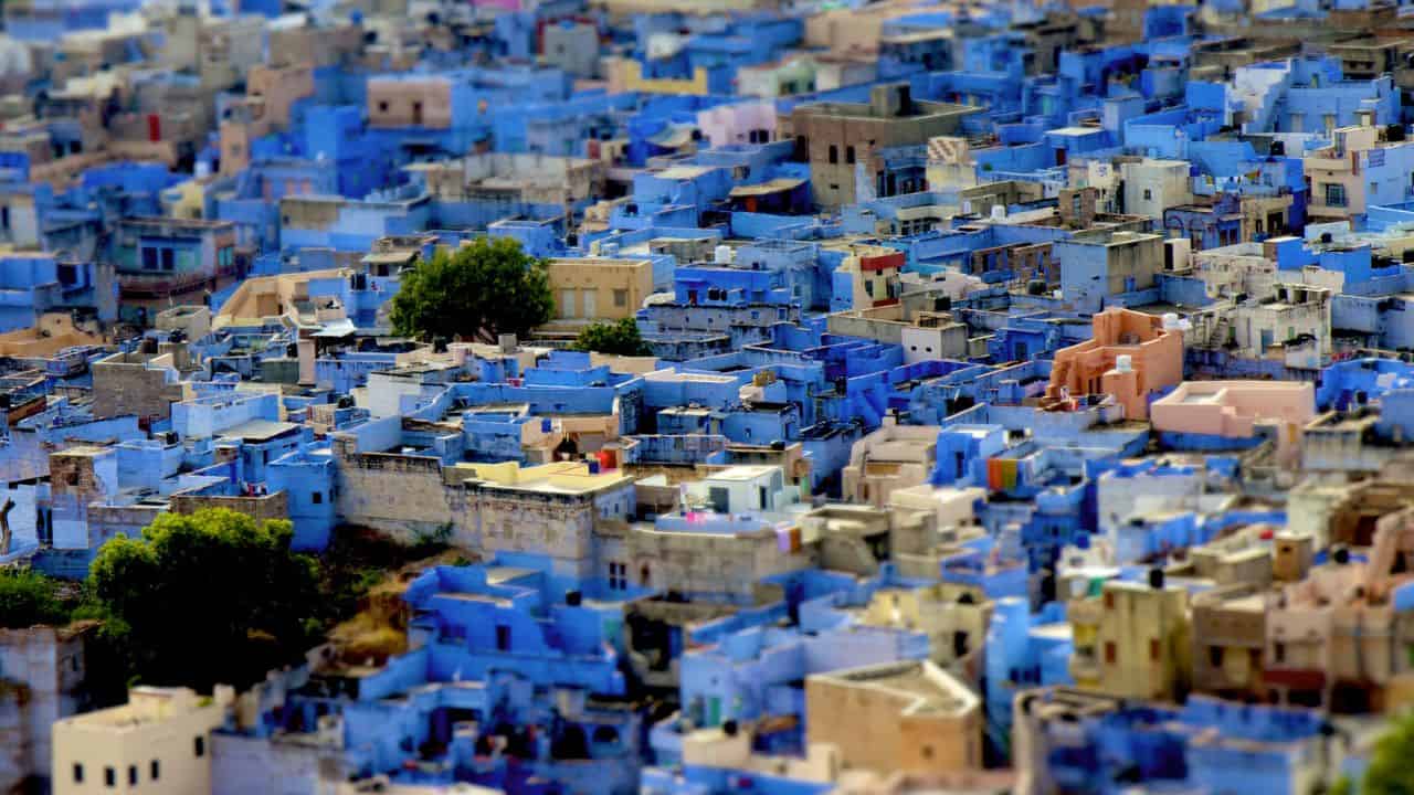 A-panoramic-view-of-Jodhpur-known-as-the-blue-city-showcasing-its-vibrant-blue-buildings-and-historic-architecture.jpg