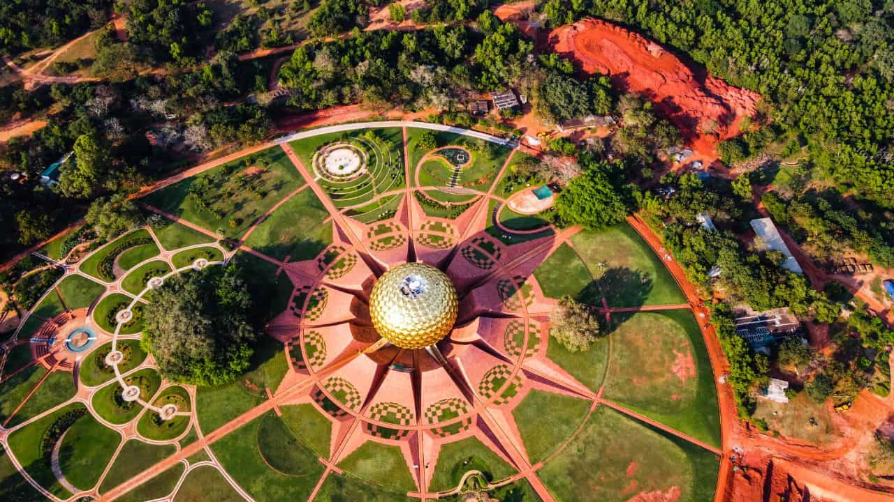 Overhead-view-of-a-circular-garden-with-the-Matrimandir-structure-at-its-center-designed-for-meditation-in-Auroville.jpg