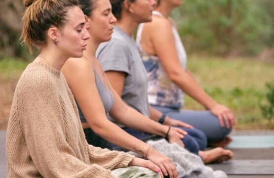 Participants-engage-in-meditation-at-Matrimandir-during-a-peaceful-yoga-retreat-555x360.jpg