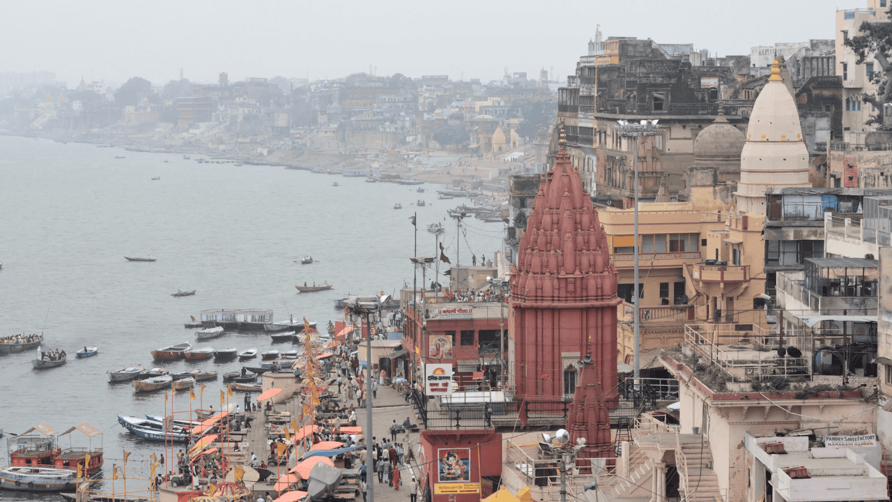 The-expansive-Ganges-River-in-Varanasi-India-showcasing-its-serene-water.png