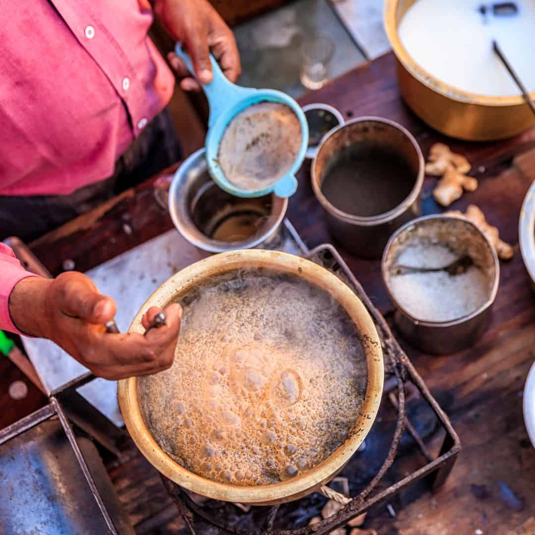 a pot of food on a table in Jaipur, India, showcasing local culinary practices a pot of food on a table in Jaipur, India, showcasing local culinary practices