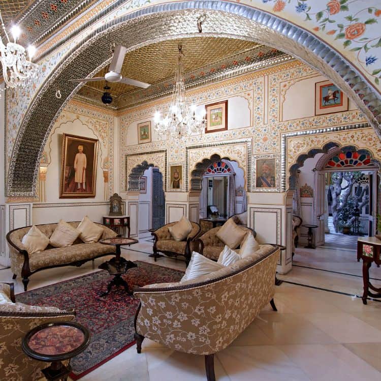 Lavishly-decorated-palace-living-room-highlighting-ornate-details-and-the-essence-of-Indias-dreamy-hospitality.jpg
