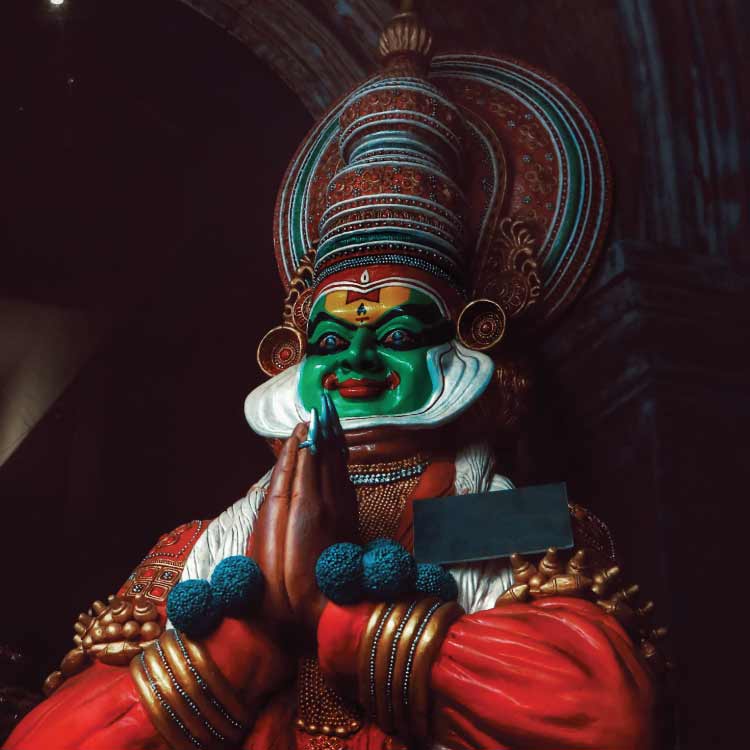 a man in traditional Kathakali costume, representing Indian classical dance performance A man in traditional kathakali costume representing Indian classical dance performance
