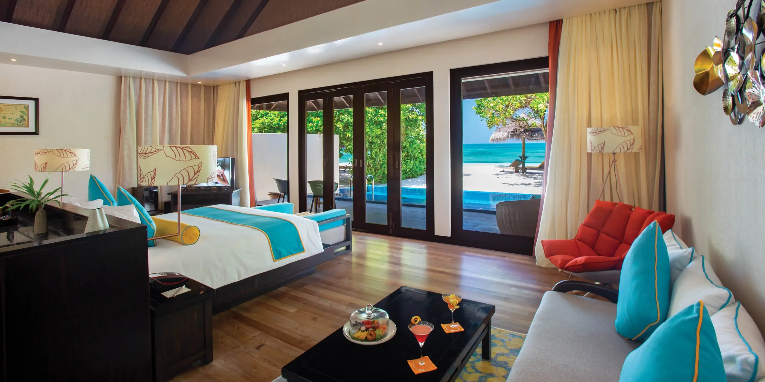 ATMOSPHERE-KANIFUSHI-MALDIVES-SUNSET-POOL-VILLA-INTERIOR-WITH-VIEW-scaled.webp