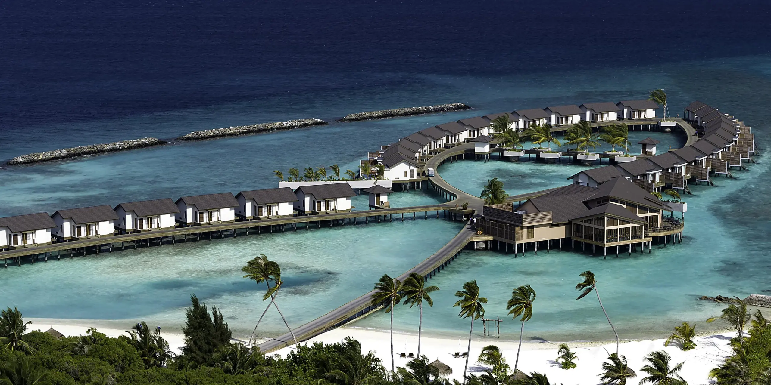 ATMOSPHERE-KANIFUSHI-MALDIVES-WATER-VILLA-AERIAL-scaled.webp
