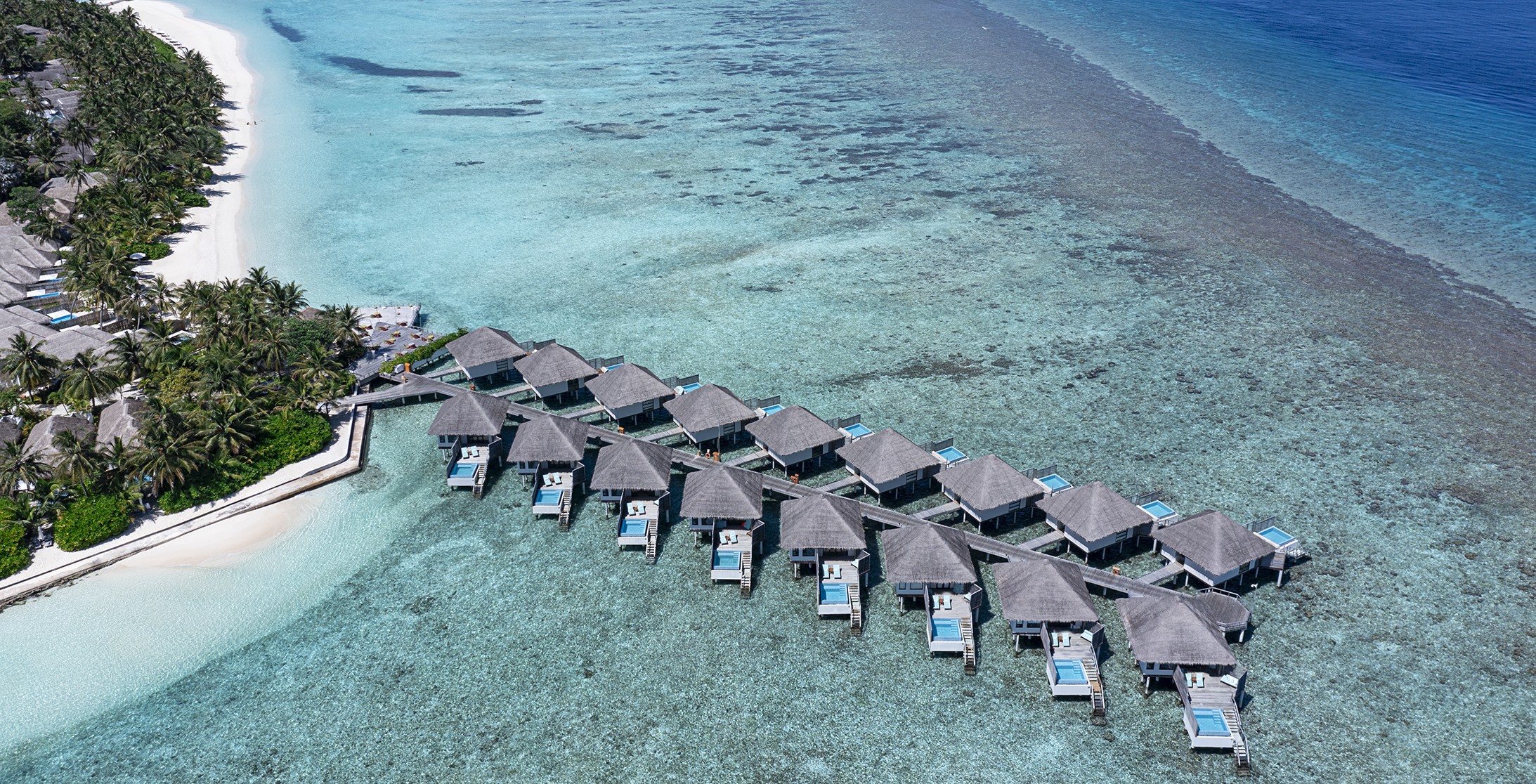 WaterBungalows_BeachToVillasDrone.jpg